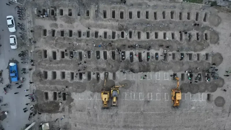 Drone footage shows rows of fresh graves in Minab, Iran, where over 150 schoolgirls were killed by a US air strike. Screenshot from video published on Facebook by Reuters. Fair use